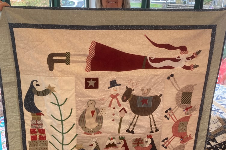 Joanie Booth-Applique Christmas wall hanging