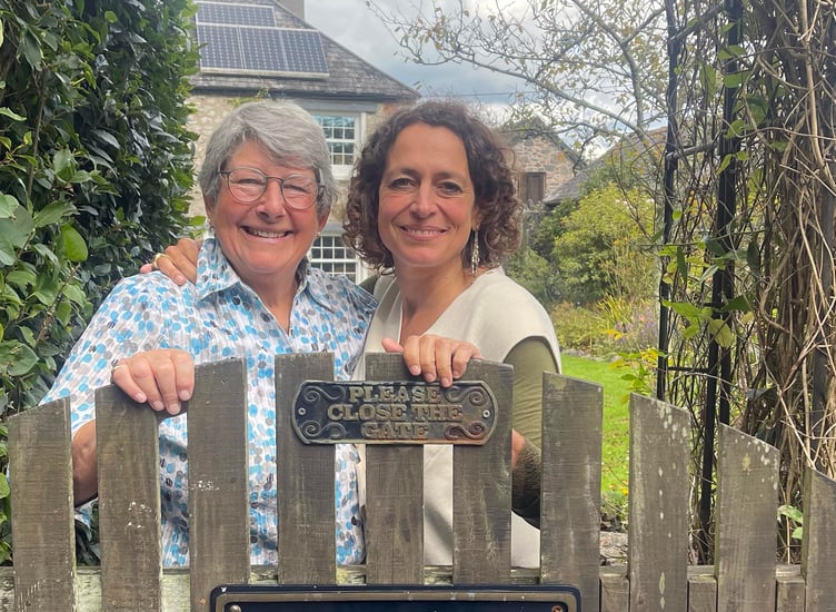 Alex Polizzi, celebrated hotelier, standing with Antonia Del Mar (owner of Appalachian Spring B&B) in front of the property, which Alex is helping improve in the episode.