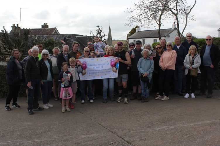 The community gathered to see Joe finish his 7 marathon in 7 days running for Butterfly Thyroid Cancer Trust.
