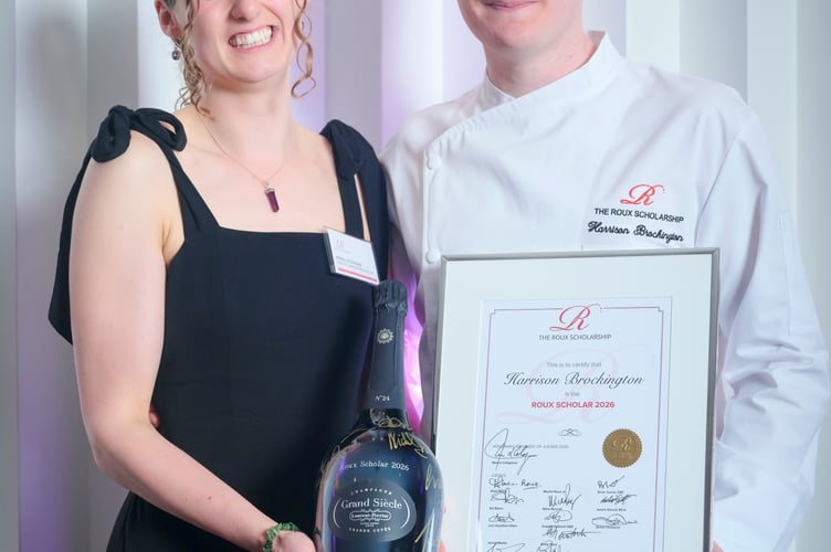 Harrison Brockington with his Roux Scholarship award and celebratory prize. 