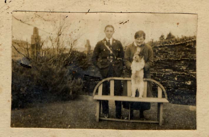 Sir William Adam Duncan Twysden with his sister and a small dog. He is wearing marines uniform during WWII. 