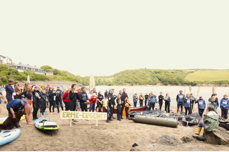 Around 100 people turned up for Surfers Against Sewage Paddle-Out Protest at Mothercombe.