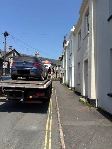 The car being towed away