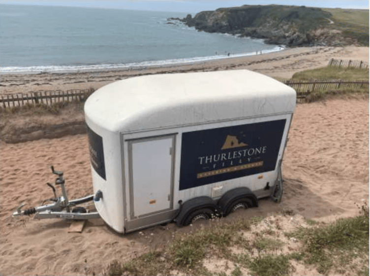 A temporary hospitality unit near Thurlestone Golf Club must be removed after planning appeal failed.